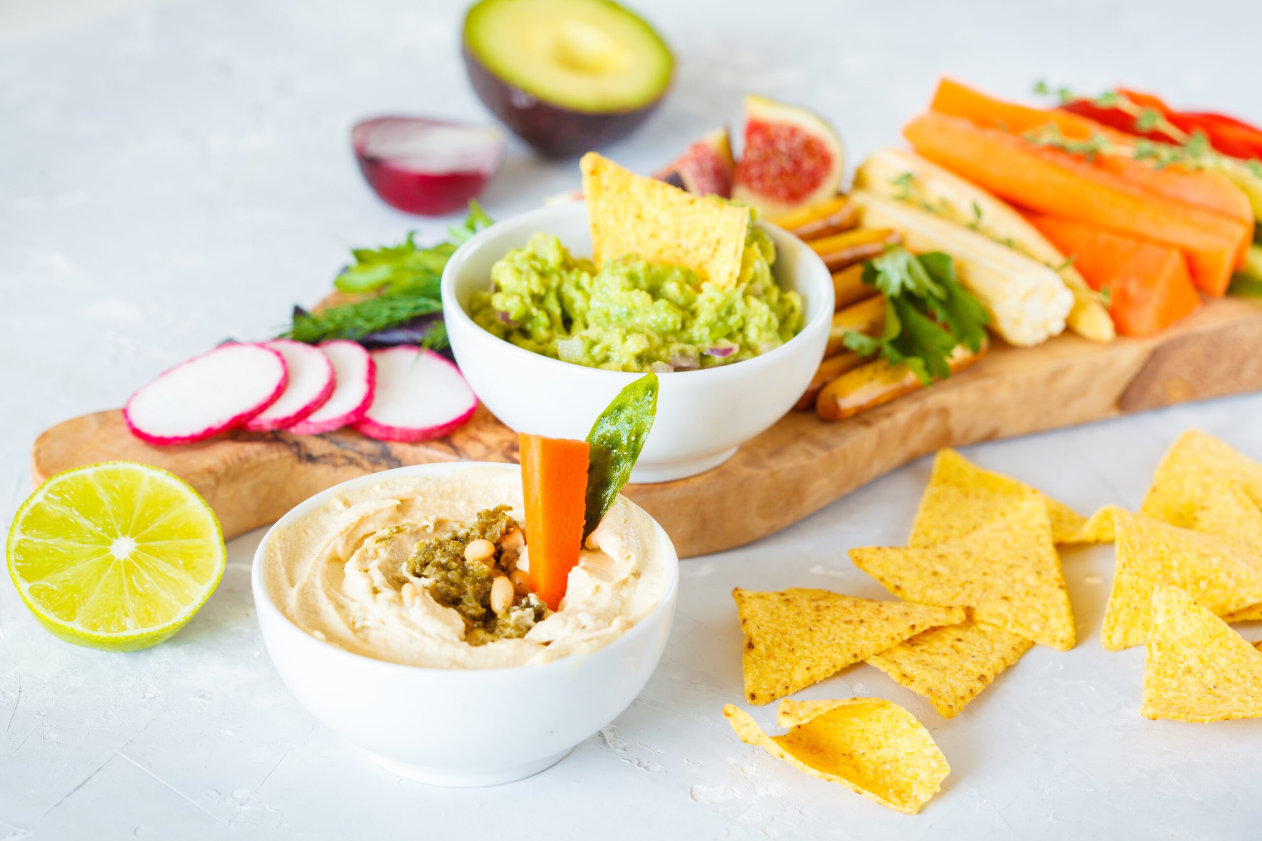 Chips and vegetables with dips