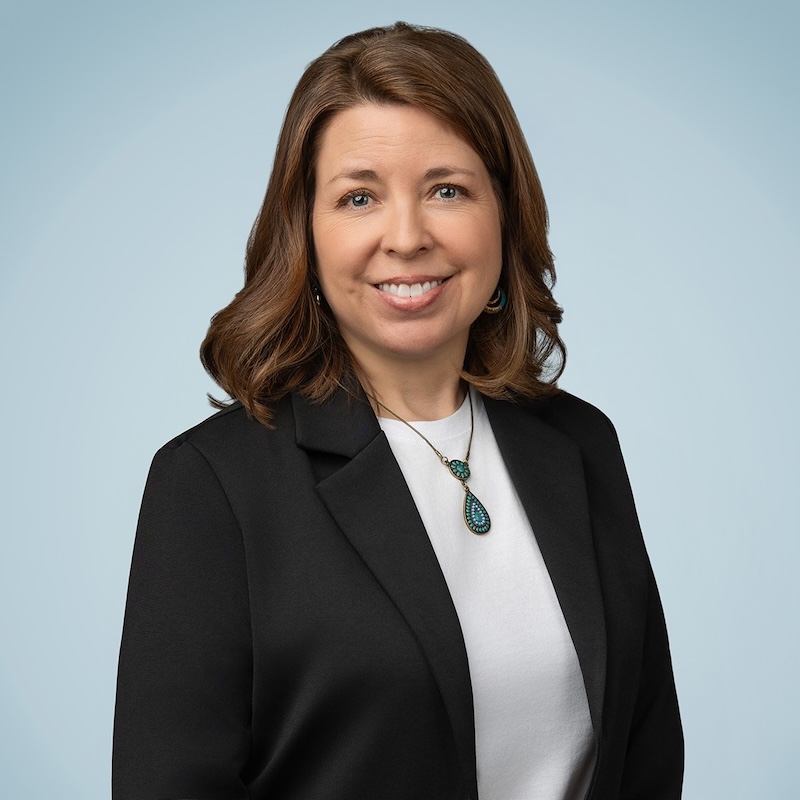 Woman in brown hair smiling